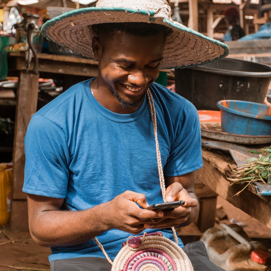 African professional using mobile banking